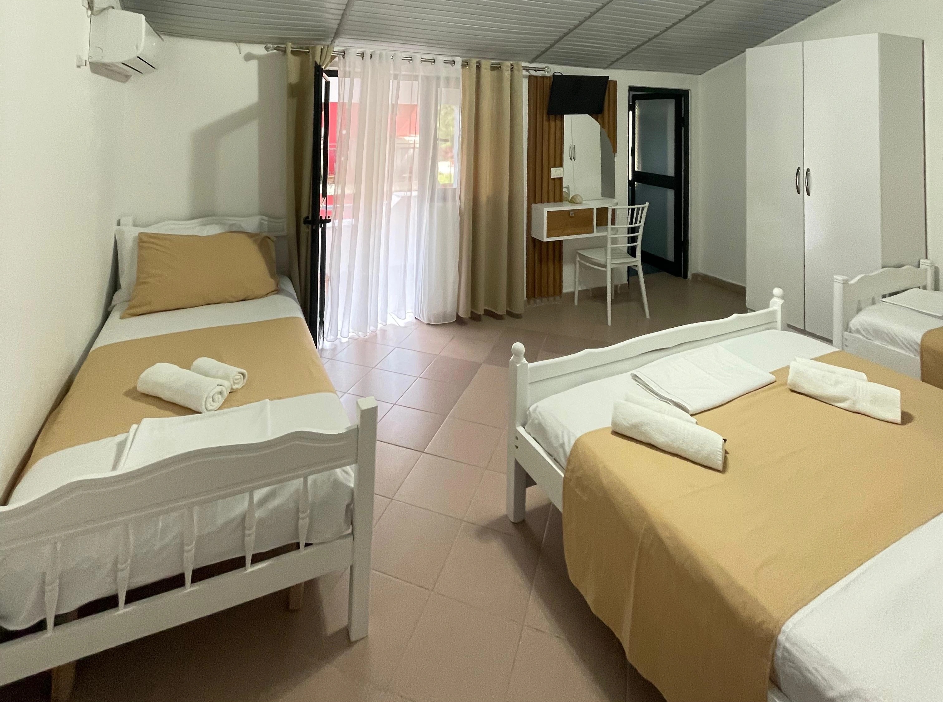 Quadruple room at Vogue Rooms Golem